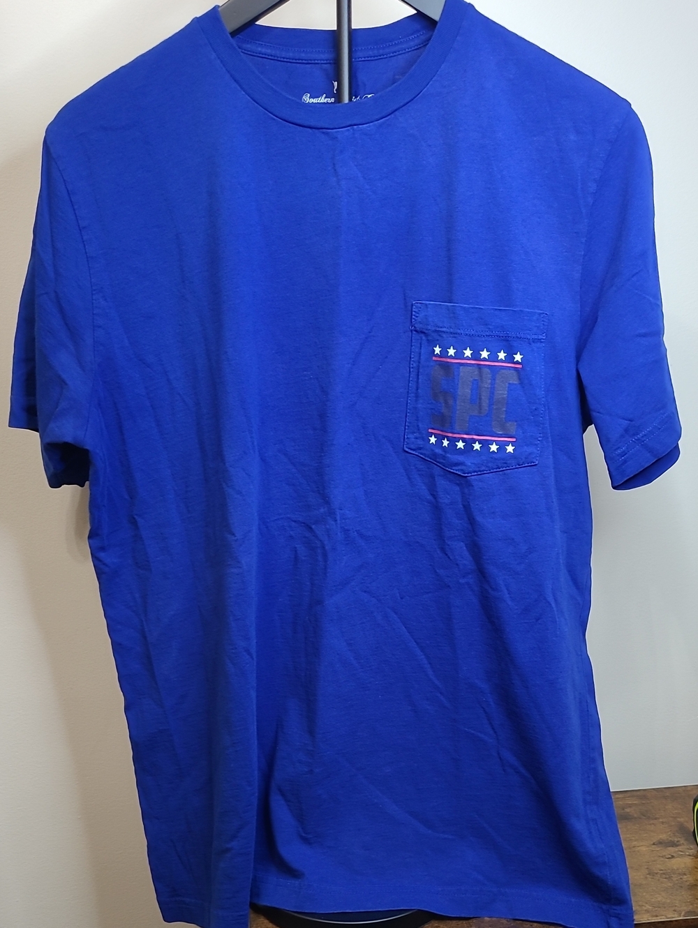 Southern Point Co. Royal Blue Pocket Tee with Colorful design on back size Large